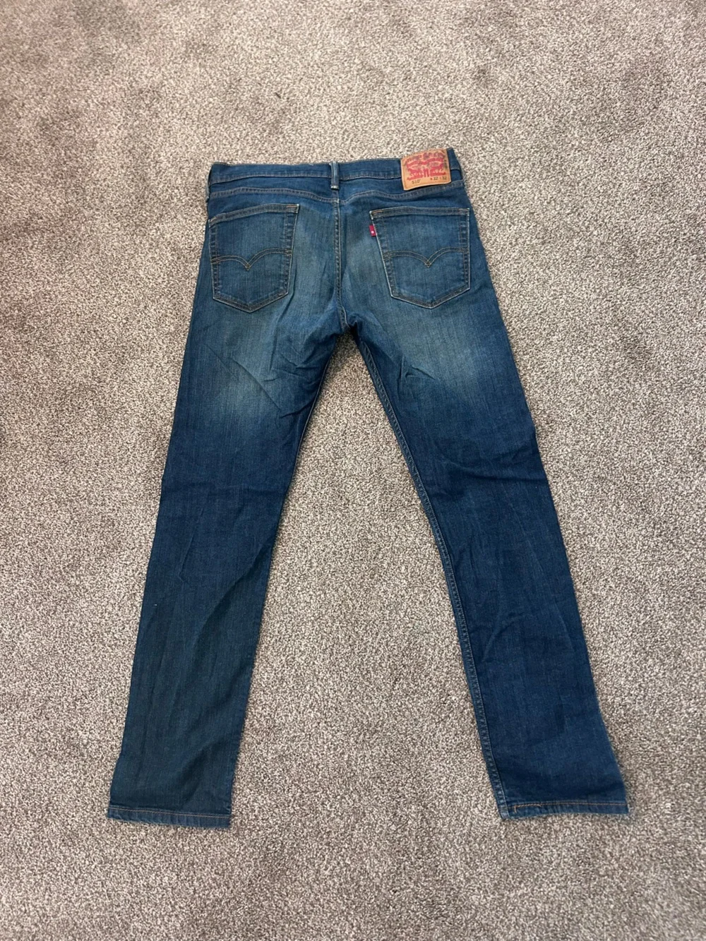 Levi's Slim Straight Jeans in Dark Blue Wash with Fading
